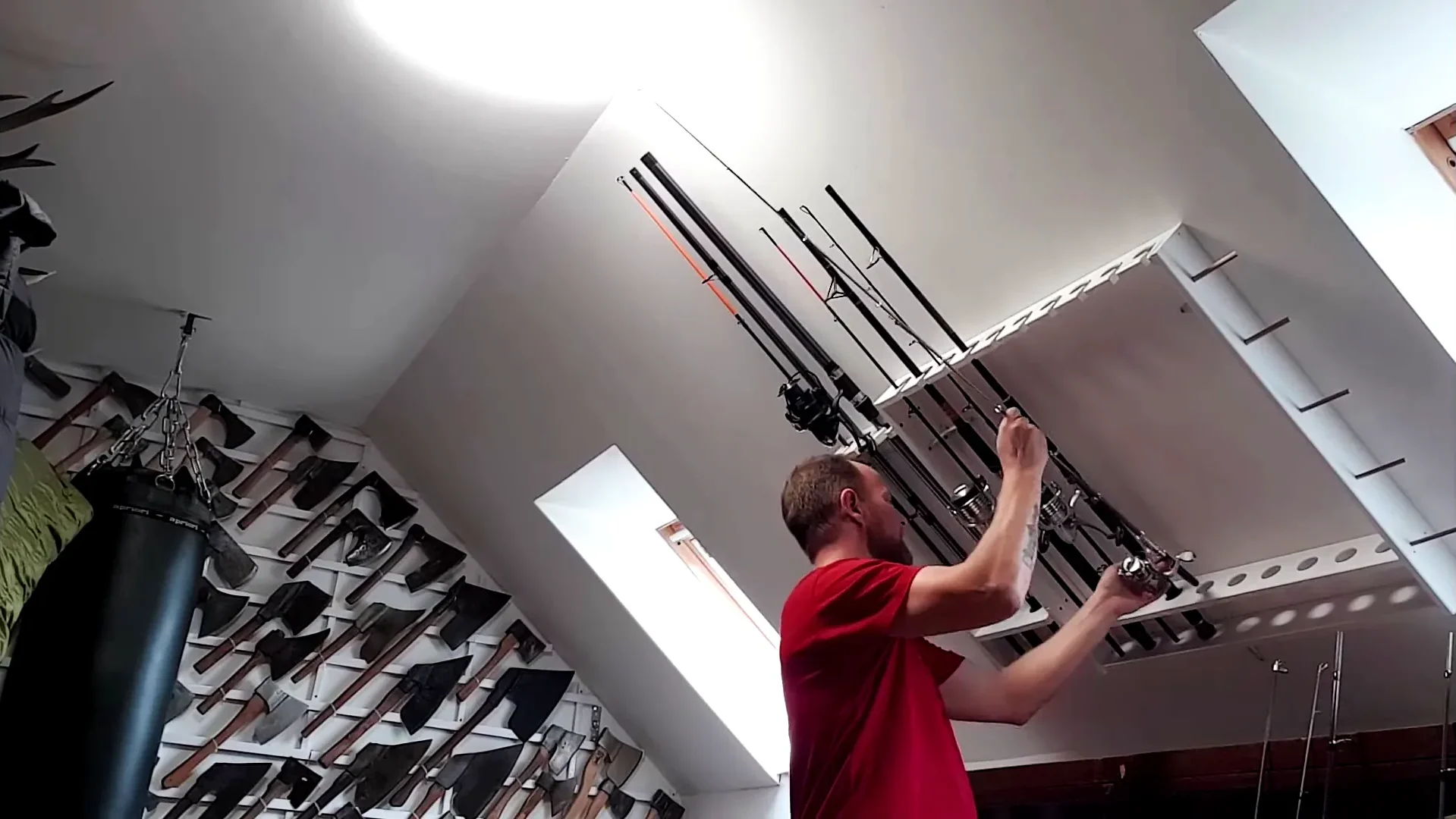 inserting your fishing rods inside the holder