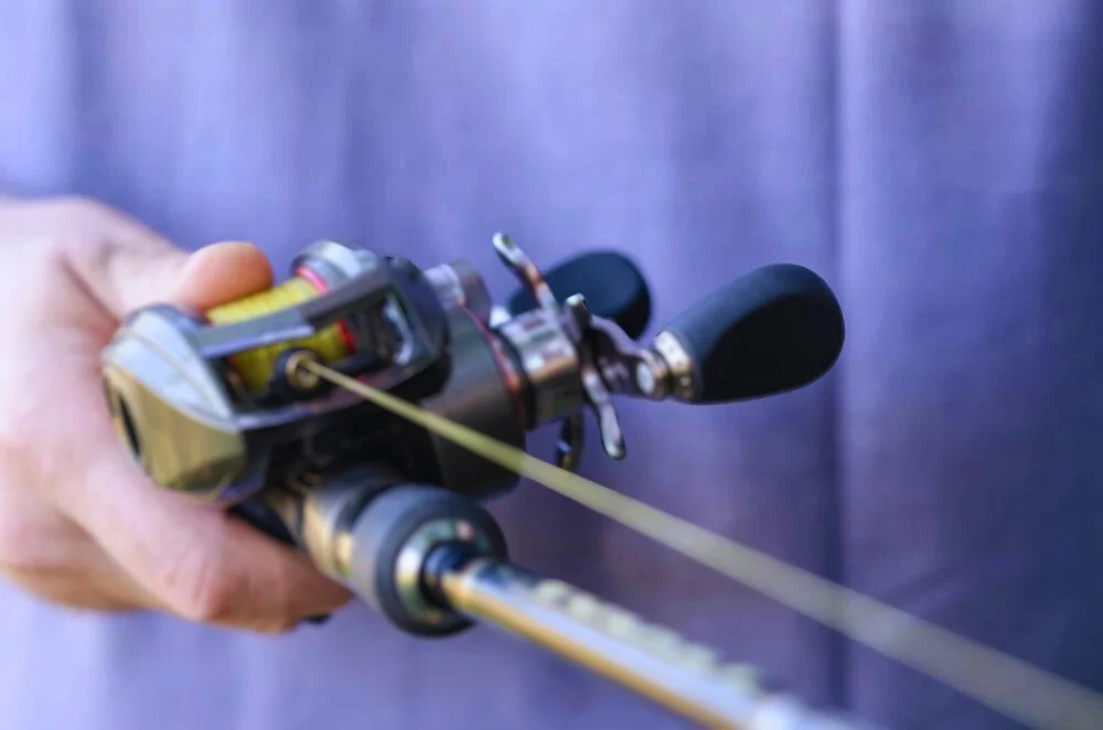 Rod with baitcaster reel and line