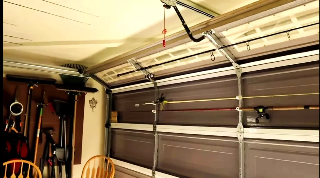 Garage door fishing rod holders for storing fishing rods in garage 