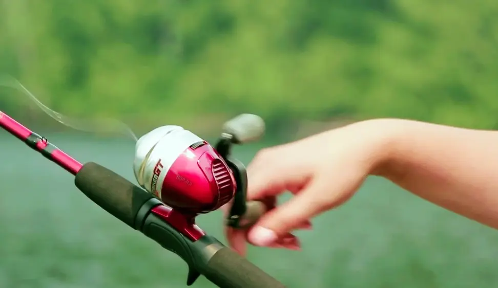 engage the reel by turning the handle